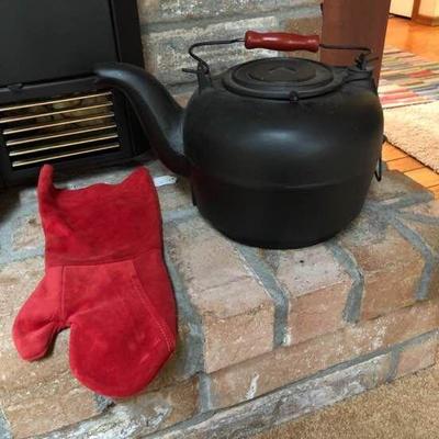 Large black cast iron kettle