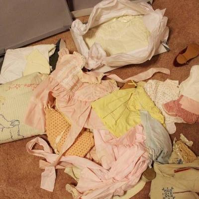 Box of Old Baby Clothes and Shoes