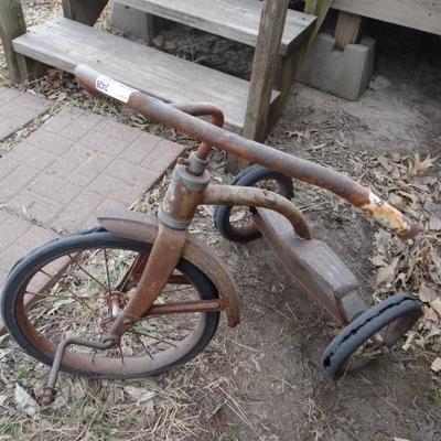 Old yard decor tricycle.