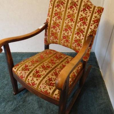Padded rocking chair.