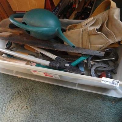 Lot of saws, trimmers, horse shoes, bolt cutters, ...