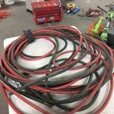 Lot of Rubber Hose with Brass Ends..