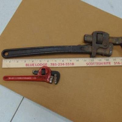 2 old pipe wrenches