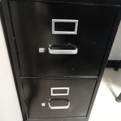 Metal 2 drawer file cabinet.
