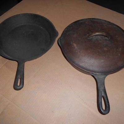 Two Cast Iron Skillets - One with Lid.jpg