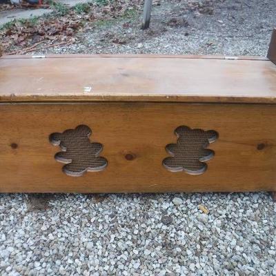 small wooden bench with storage