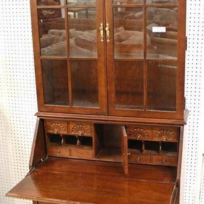  Mahogany Block Front Slant Front Desk with Bookcase Top by “Jasper Cabinet”

Located Inside – Auction Estimate $300-$600

  