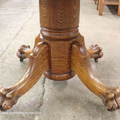  ANTIQUE Quartersawn Oak 48â€ Paw Foot Table with 3 Leaves

Located Inside â€“ Auction Estimate $100-$300 
