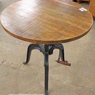  Industrial Style Oak Top Crank Table

Located Inside â€“ Auction Estimate $200-$400 
