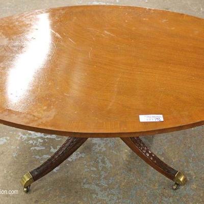  Oval Mahogany Banded Coffee Table by â€œKindell Furnitureâ€

Located Inside â€“ Auction Estimate $100-$200 