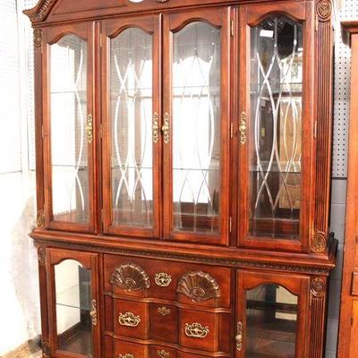  Contemporary Mahogany Shell Carved 2 Piece Broken Arch China Cabinet with Curio Base by “Kathy Ireland Home”

Located Inside – Auction...