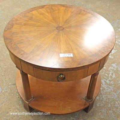  Burl Walnut Sunburst Top One Drawer Lamp Table by â€œBaker Furnitureâ€

Located Inside â€“ Auction Estimate $100-$200 