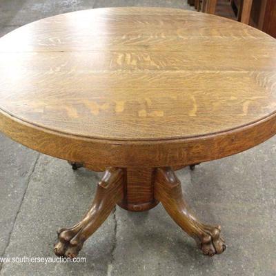  ANTIQUE Quartersawn Oak 48â€ Paw Foot Table with 3 Leaves

Located Inside â€“ Auction Estimate $100-$300 