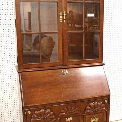  Mahogany Block Front Slant Front Desk with Bookcase Top by “Jasper Cabinet”

Located Inside – Auction Estimate $300-$600

  