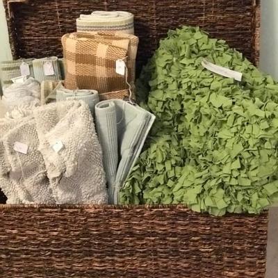 lots and lots of bed and bath linens, pillows, area rugs and window shades