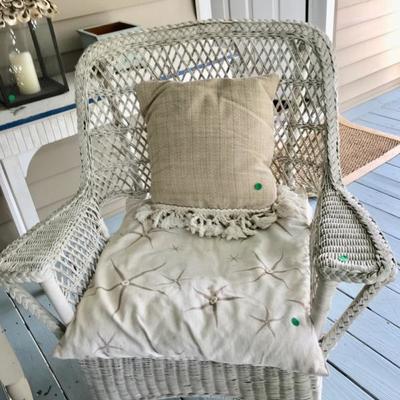 Wicker arm chair with cushion $49
2 available