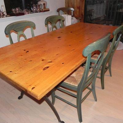 Knotty Pine dining table with iron base from England. Sold with or without 6 pottery barn chairs !  