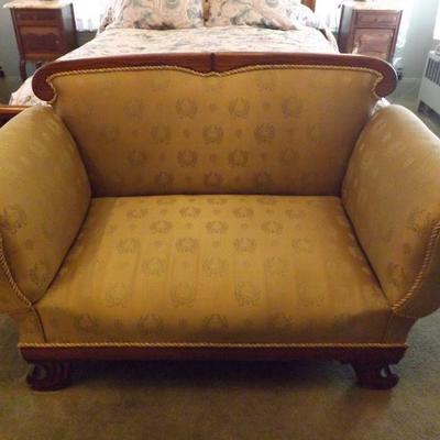 Antique Fainting Couch. the sides pull down.