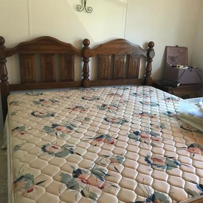 King bed with older but clean mattress, matching dresser and night stands 