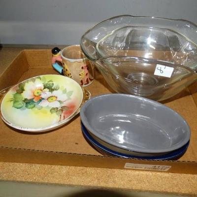 Lot of glassware plates, bowls and cups.