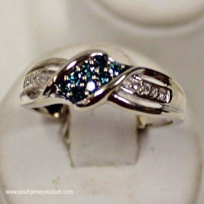  10kt White Gold Blue and White Diamond Ring â€“ aucton estimate $200-$500 