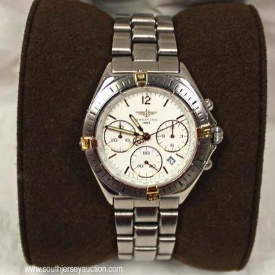  Stainless Steel Unisex Breitling Chronograph Watch with Box and Papers â€“ auction estimate $600-$1200 