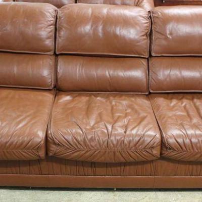  Contemporary 2 Piece Brown Leather Sleeper Sofa and Loveseat â€“ auction estimate $300-$600 