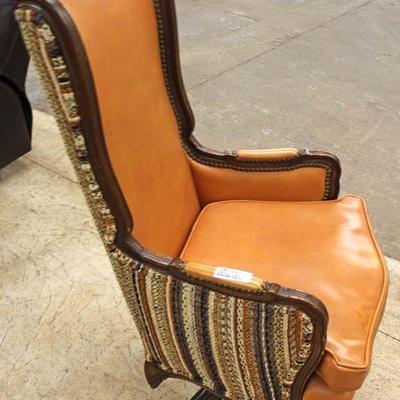  High Back Leather and Upholstered Swivel Chair â€“ auction estimate $100-$200 