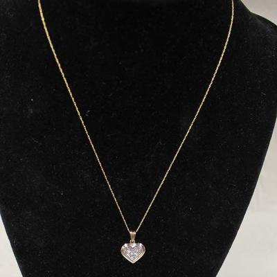 14 Karat Yellow Gold Â½ CTW Diamond Heart Pendant and 18â€ Necklace â€“ auction estimate $300-$600 