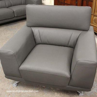  NEW Italian Leather Modern Design Sofa by â€œKendi Furnitureâ€ â€“ auction estimate $400-$800

NEW Italian Leather Club Chair by...