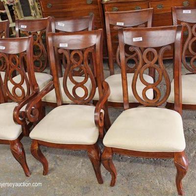  9 Piece Contemporary Mahogany Finish Inlaid Dining Room Table with 8 Queen Anne Chairs â€“ auction estimate $300-$500 