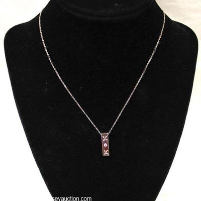 RARE Tiffany and Company Sterling Silver â€œXOâ€ Pendant with Diamond and Necklace â€“ auction estimate $200-$400 