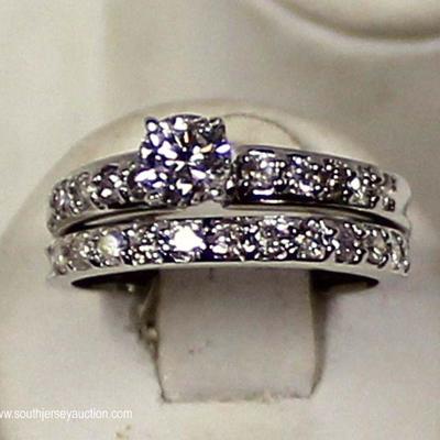 14 Karat White Gold .44 Round Diamond Center 2/3 CTW Bridal Ring Set â€“ auction estimate $600-$1200 