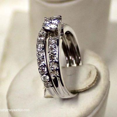 14 Karat White Gold .44 Round Diamond Center 2/3 CTW Bridal Ring Set â€“ auction estimate $600-$1200 