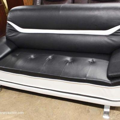  NEW Leather Modern Design Sofa â€“ auction estimate $300-$600

  