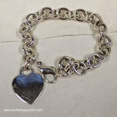  Sterling Silver Tiffany and Company Heart Bracelet â€“ auction estimate $100-$200 