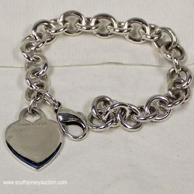  Sterling Silver Tiffany and Company Heart Bracelet â€“ auction estimate $100-$200 