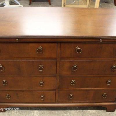 Mahogany 8 Drawer Low Chest by “Baker Furniture” – auction estimate $100-$300 