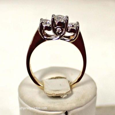  14 Karat Yellow Gold 1 CTW Diamond 3 Stone Ring â€“ auction estimate $700-$1200 