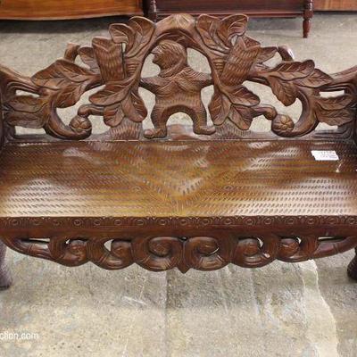  Highly Carved Wood Bear Bench â€“ auction estimate $200-$400 