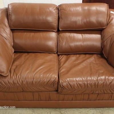  Contemporary 2 Piece Brown Leather Sleeper Sofa and Loveseat â€“ auction estimate $300-$600 