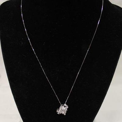  18 Karat White Gold 1/3 CTW Diamond Pendant and Necklace â€“ auction estimate $300-$600 