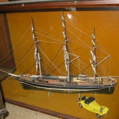 very nice large sailing ship in glass display case