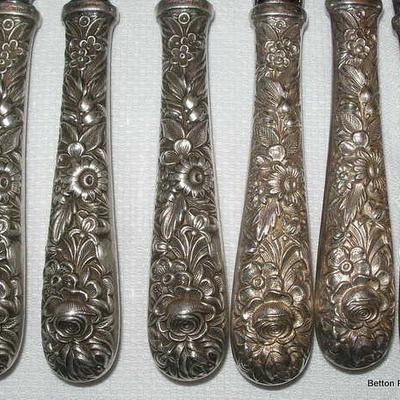 Close up of Kirk Repousse Handles
