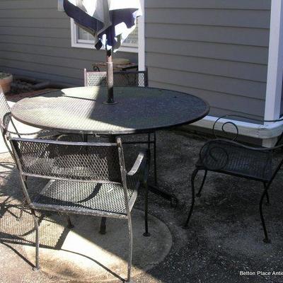 Metal Outdoor Table with Umbrella and Four Chairs