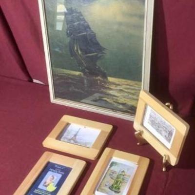 Four small pine framed prints 