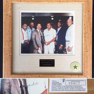 Mohammad Ali autographed and framed photo. In the picture are also George Foreman, Evander Holyfield, Reggie Jackson, Joe Frasier, and...