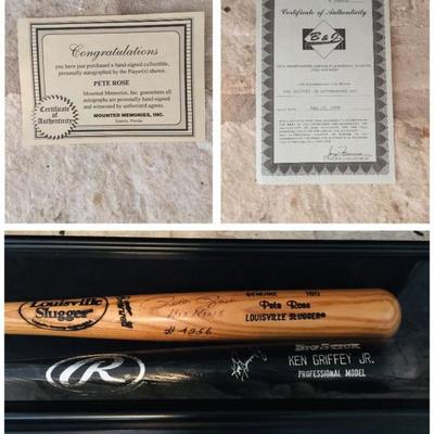 Two signed bats inside of a shadow box. Pete Rose and  Ken Griffey (HOF) bats with their signatures. Each has a certificate. Estate sale...