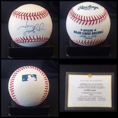 Signed and certified baseball by JASON GIAMBI. It also comes with an acrylic case. Estate sale price: $125