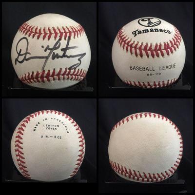 Baseball autographed by Dennis 